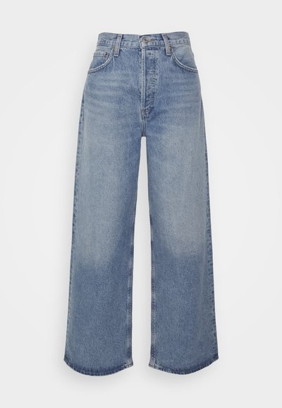 Light blue denim wide-leg jeans with a high waist, featuring a button closure, five pockets, and frayed hems. Smooth texture, relaxed fit.