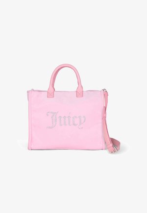 Borsa tote in velluto rosa con la scritta "Juicy" in strass, manici e tracolla removibile, texture liscia, design strutturato e bordi arrotondati.