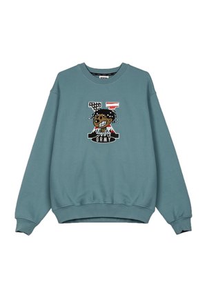 Turkusowy sweter z okrągłym dekoltem i długimi rękawami z grafiką kreskówkowego uśmiechniętego bohatera. Wykończony ściągaczami przy mankietach i dole.