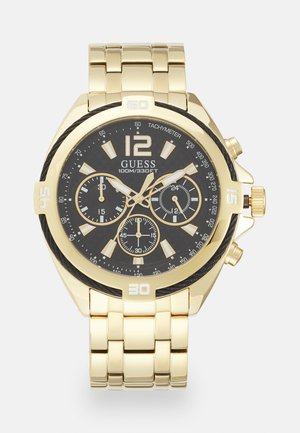 Montre chronographe dorée avec un cadran noir, des accents argentés, un tachymètre et un bracelet maillon. Comprend trois sous-dials et des marqueurs d'heure audacieux.