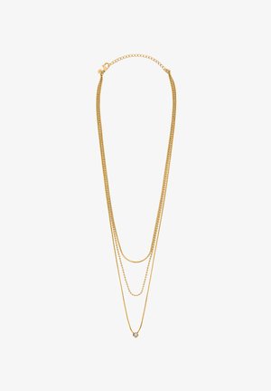 Collier doré à plusieurs couches, composé de trois chaînes de différentes épaisseurs, orné d'une seule pierre claire à la base.
