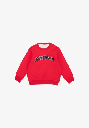 Felpa rossa realizzata in morbido tessuto con maniche lunghe, polsini e orlo a coste, caratterizzata dal testo "JECKERSON" in colori a contrasto e in grassetto.