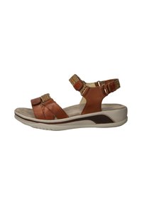 Brown leather sandal with two adjustable straps, woven detailing, and a cushioned footbed. Features a light-colored outsole with a dark accent.