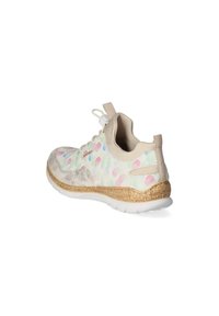 Sneaker with a flexible, light-colored upper featuring pastel polka dots, textured beige accents, and a cork-like midsole with white sole.