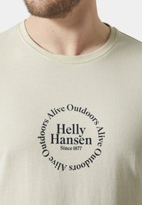 Helly Hansen CORE GRAPHIC - Camiseta estampada - cream
