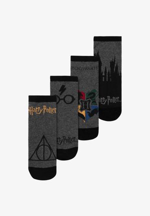 Four pairs of gray cotton socks featuring Harry Potter designs: logos, symbols, and Hogwarts colors in patterns on varying background shades.