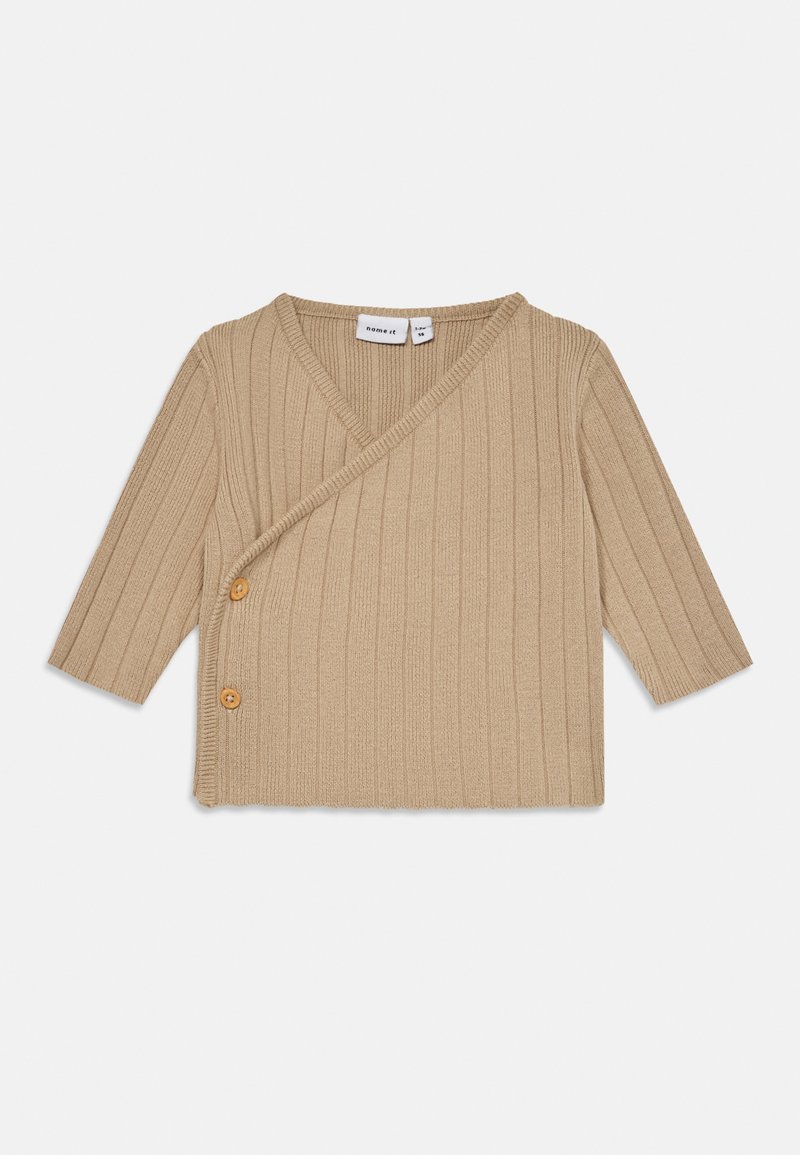 Beige ribbed knit baby cardigan with three-quarter sleeves, V-neck, and two wooden buttons on one side.