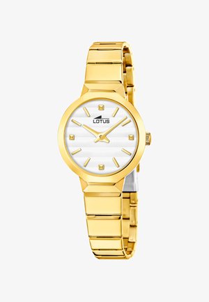 Reloj de pulsera Lotus en tono dorado con esfera blanca texturizada, marcadores de hora minimalistas, tres manecillas y una correa de metal enlazada.