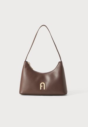 Brown leather handbag with a curved shape, a zip closure, and a gold-tone logo accent on the front. Smooth texture, slim shoulder strap.