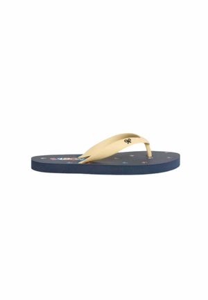 Chancla azul con tiras beige que presentan un pequeño logo negro, decorada con diminutas flores multicolores en la suela.