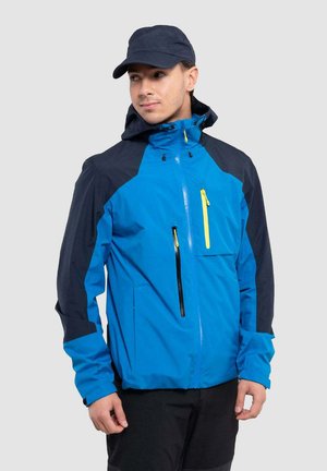 Men's jacket featuring a blue body, navy sleeves, and yellow zippered accents. Material is smooth, with a zip front and hood.