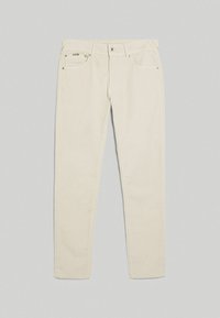 Pantalon beige clair ajusté en coton, avec une texture lisse, cinq poches et des éléments en métal pour la fermeture et les accents.