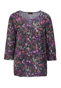 Transparente schwarze Bluse mit einem mehrfarbigen Blumenmuster in Lila, Grün und Braun, mit einem runden Ausschnitt und drei Viertel langen Ärmeln.