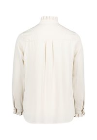 Crème-kleurige blouse met een ruches-kraag, geplooide achterkant, lange mouwen met knoopmanschetten en een gladde, lichte textuur.