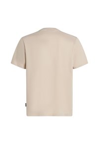 Lyhyet hihat ja pyöreä kaula-aukko, vaaleanbeige puuvillapaita. Pehmeä rakenne, täysin yksivärinen selkä ja pieni tuotemerkki alareunassa.
