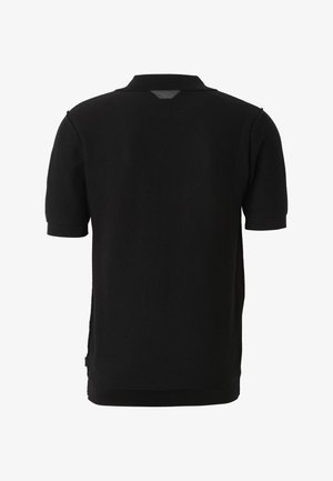 Black short-sleeve polo shirt with a ribbed collar and cuffs, shown from the back on a white background.