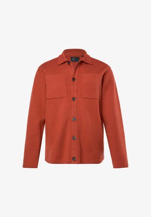 Roodbruine shirtjack met knopen, twee borstzakken en lange mouwen. Gemaakt van een textuurstof met een gladde afwerking.