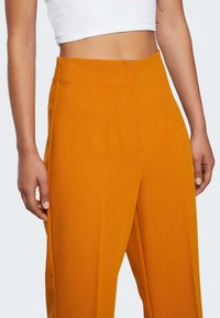 b.young Tygbyxor - dark yellow