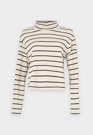 Langarm-Turtleneck-Oberteil in Creme mit schwarzen horizontalen Streifen; weicher Stoff, lockere Passform, verkürztes Design und glatte Textur.