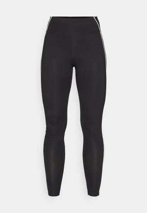 Schwarze Leggings aus dehnbarem Material mit hohem Bund. Merkmale sind weiße Seitenstreifen und eine glatte Textur.