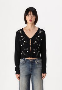 Object OBJTHESS  - Vesta na kopčanje - black