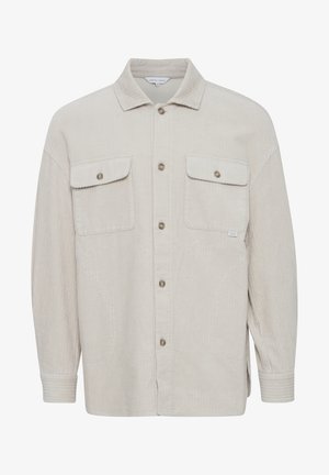 Šviesiai ruda kordūrovala su apykakle, mygtukų uždarymu, dviem krūtinės kišenėmis ir šonkačių rankogaliais. tekstūruotas audinys su vertikaliomis juostelėmis.