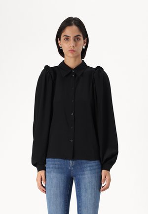 Black long-sleeve blouse with a shirt collar, puffed shoulders, and button closure. Made of smooth fabric, featuring a loose fit.