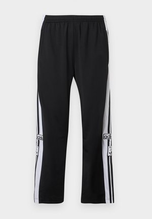 Fekete sportnadrág fehér oldalsávokkal, elasztikus derékpánttal és logó részlettel. Simább, könnyű anyagból készült.