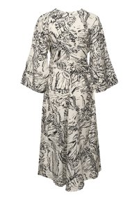 Blommönstrad omlottklänning i svart och vitt, med trumpetärm och knytning i midjan, tillverkad av mjukt, texturerat tyg.