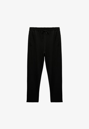 Pantalones de chándal negros hechos de tela suave, con una cintura elástica y cordón, dos bolsillos laterales y un diseño de pierna ajustada.