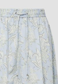 Jupe bleu clair avec taille élastique et cordelette, présentant un motif floral cachemire blanc et vert pâle.
