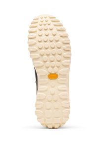 Vibram-pohja, jossa on teksturoitu beige kumipinta, jossa on sarja pyöreitä ja suorakulmaisia pitoja pitävyyden ja kestävyys. 