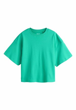 T-shirt turquoise uni à manches courtes, col rond et coupe ample, nom de la marque "NEXT" visible à l'intérieur du col.
