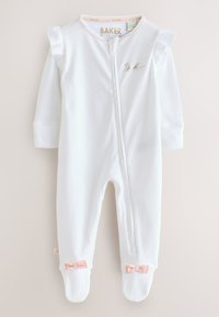 Baltas vaikų jumpsuit'as iš minkštos medžiagos, su užtrauktuku priekyje, raukiniais ant pečių ir rožinėmis kaspino detalėmis ant kojų. Aukso logotipas ant krūtinės.