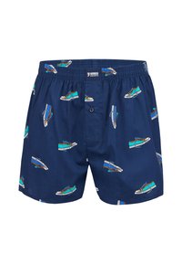 Boxer shorts blu navy con elastico in vita e un motivo di scarpe da ginnastica in teal, bianco e arancione stampate su tutta la superficie.