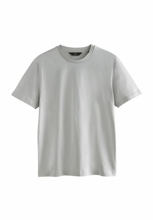 Jasnoszara koszulka z gładkiej bawełny, z klasycznym okrągłym dekoltem, krótkimi rękawami oraz luźnym krojem i minimalnymi detalami w szwie.