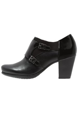 Schwarzer Damen-Stiefelette aus Leder mit zwei Seitenriemen und einem gestapelten Blockabsatz.