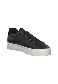 Black leather sneaker with a sleek design, featuring gold-tone eyelets, black laces, and a white rubber sole with textured pattern.