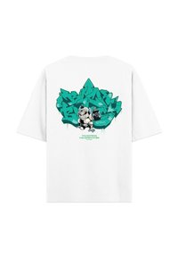 Witte katoenen t-shirt met een grafische print in teal en zwart, met gestileerde tekst en een cartoonfiguur op de achterkant.