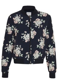 Veste bomber fleurie en bleu marine, ornée de fleurs roses et blanches. Fermeture éclair, poignets et ourlet côtelés, tissu léger et lisse.