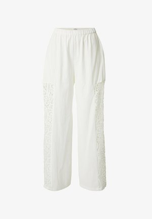 White loose-fit pants with elastic waistband and lace panels running down the outer sides of the legs.