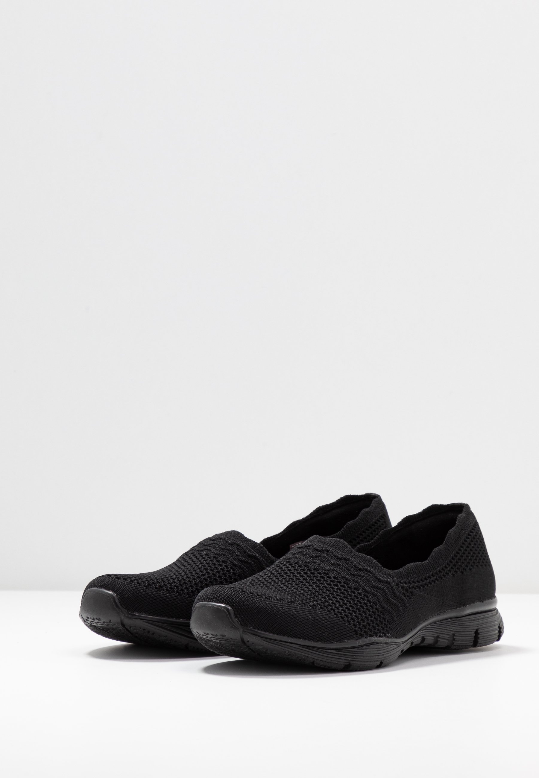 black skechers slip ons