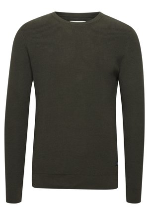 Tamsiai žalia raštuota megztinė su ilgomis rankovėmis, apvaliu kaklu ir prigludusia siluetu. Tekstūruotas audinys su subtiliu raštu ir be matomų logotipų.