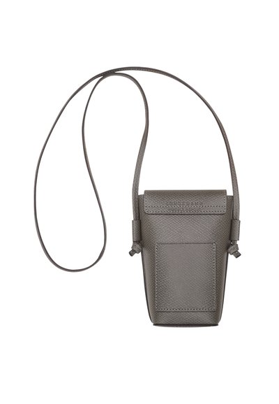 Gray leather crossbody bag with a textured finish, featuring a flap closure and front pocket. Includes a slender adjustable strap.