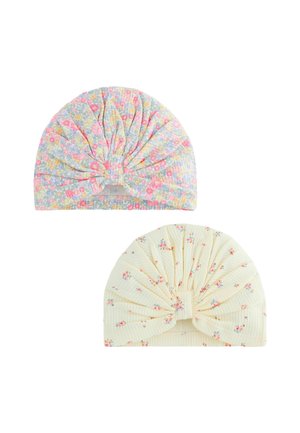 To baby turbans med sløjfer, den ene pastel multi-farvet blomstret og den anden cremefarvet med små orange og blå blomsterprint.