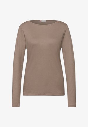 Langärmeliges Oberteil mit Rundhalsausschnitt in Beigefarbe. Hergestellt aus weicher Baumwolle, mit glatter Textur und schlichtem, klassischem Design.
