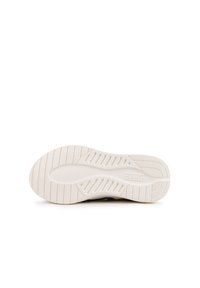Suela de zapato con una superficie de goma blanca texturizada, que presenta ranuras horizontales y un corte central para mayor flexibilidad, con la marca "MUNICH."