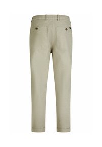 Licht beige, gemêleerde broek met een elastische tailleband, twee achterzakken en opgerolde manchetten. Het materiaal lijkt zacht en casual.