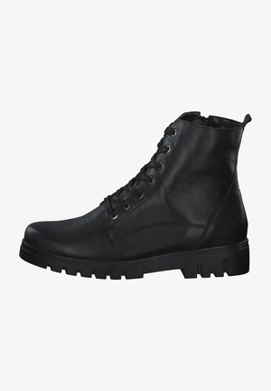Bottines en cuir noir avec un bout arrondi, un devant à lacets et une semelle texturée comportant de profondes rainures pour une meilleure adhérence.
