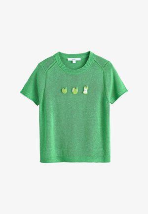 Green short-sleeve knit top with ribbed collar and cuffs, featuring three embroidered green apple designs across the chest.